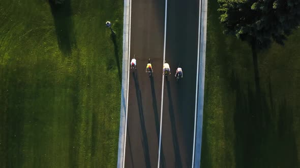 Four Persons Riding Bikes Aerial View