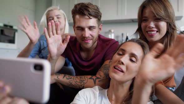 Smiling people has video call with friend. Shot with RED helium camera in 8K