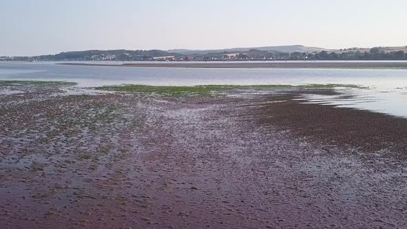 AERIAL VIDEO flying over river estuary