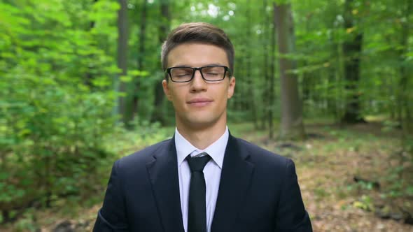 Successful Businessman Enjoying Work in Park, Good Air Conditioning in Office