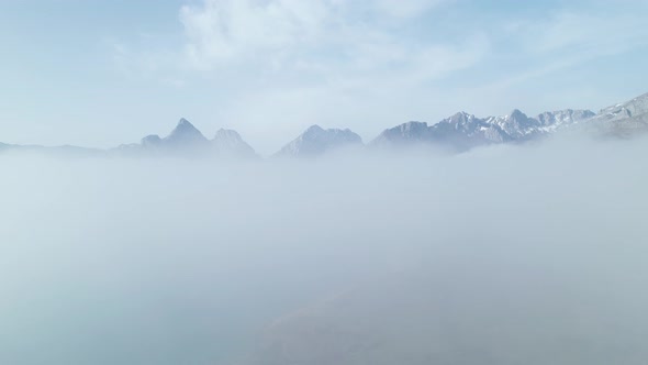 Drone camera flying through mist over a lake in León, Spain. Shot through fog perfect for titles, in