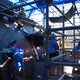 Workers Welding a Piece of Wind Turbine - VideoHive Item for Sale