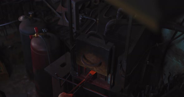 Blacksmith is Using Tongs for Taking Red Hot Billet From Gas Furnace in Forge  Prores