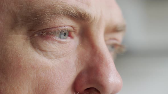 Old Man's Eyes Closeup Footage: Pensive Old Man Thoughtful Elder