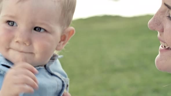 Adorable Baby Waving before Camera alt