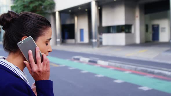 Businesswoman talking on mobile phone