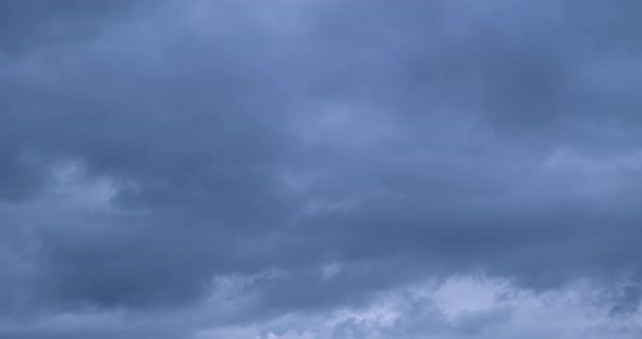 Footage Dark Gray Storm Clouds Moving Fast Across Sky Time Laps