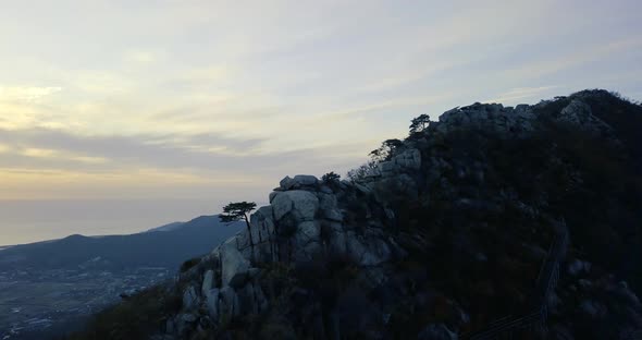 Aerial view over the rocky mountain at sunset