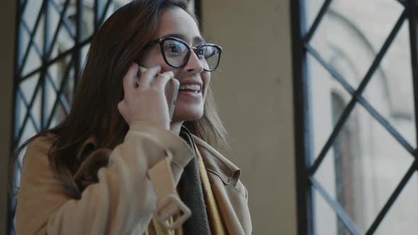 Student Talking on Cellphone in University. Businesswoman Calling on Smartphone