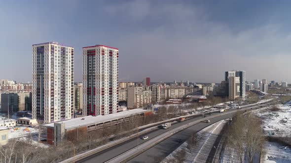 Aerial view of Highway with car traffic in the winter city 01