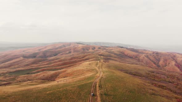 4wd Tour Vehicle With Georgian Mountains Landscape