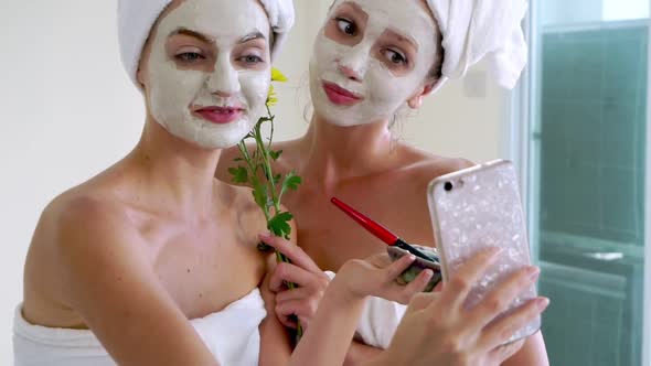 Beautiful Woman Having a Facial Treatment at Spa