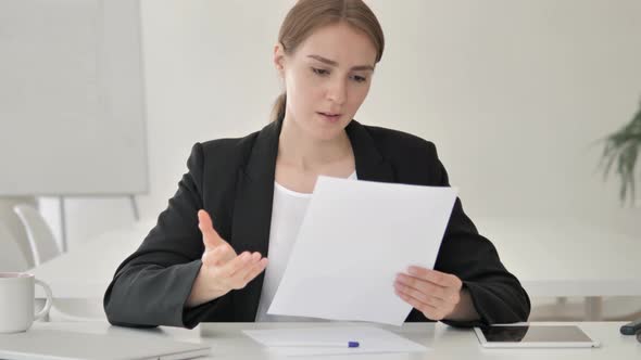 Young Businesswoman Tearing Contract, Throwing away Paper