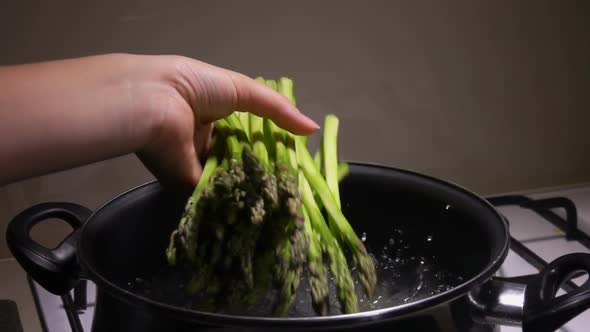 Asparagus Stems Are Thrown Into Boiling Water