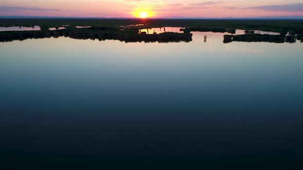 Aerial View of The Ailik Lake During Sunset with Colorful Light. 