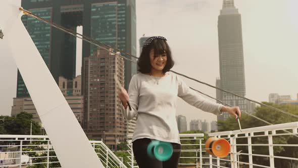 Taiwanese woman playing with a Chinese Yo-Yo