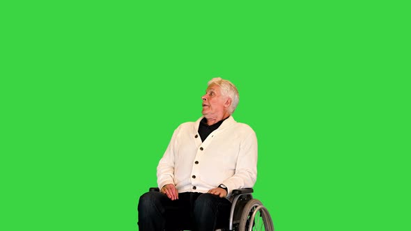 Senior Patient on a Wheelchair Waiting for the Relatives To Come on a Green Screen Chroma Key