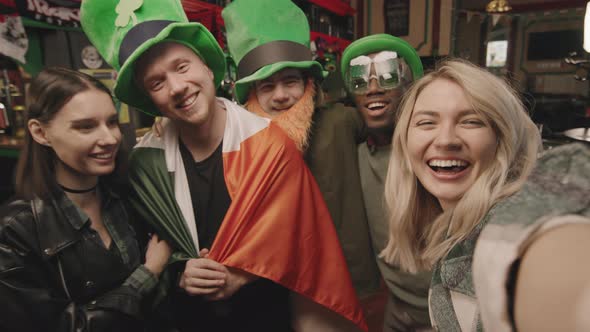POV Of Happy Friends In Bar On St Patricks Day
