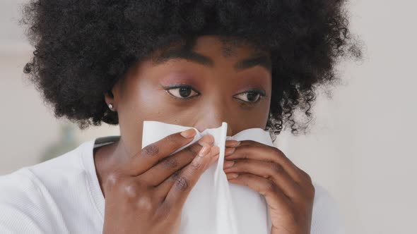 Allergic Ill Lady Young African American Woman Running Nose Got Flu Sneezing in Tissue Sick