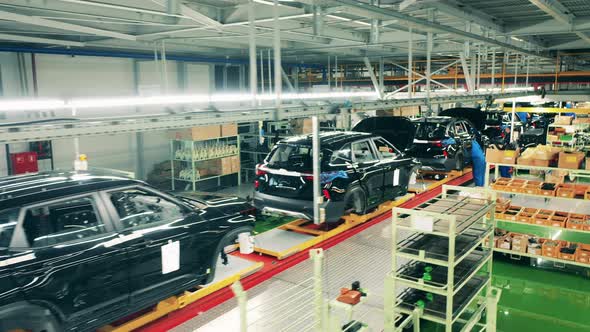 Automobile, Car Factory Conveyor. Car Bodies in the Factory Unit in the Process of Assembly