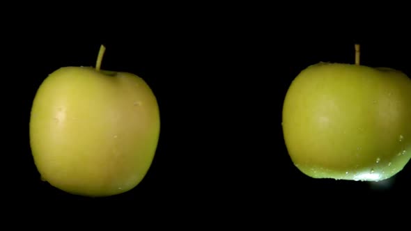 Two Ripe Green Apples Are Flying Towards Each Other in Super Slow Motion