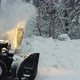 Snowcovered Man Cleans the Road in Winter with Blower Snow Removal Equipment - VideoHive Item for Sale