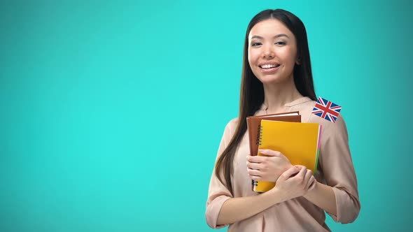 Cheerful Woman Holding British Flag Book, Education Abroad, Learning Language