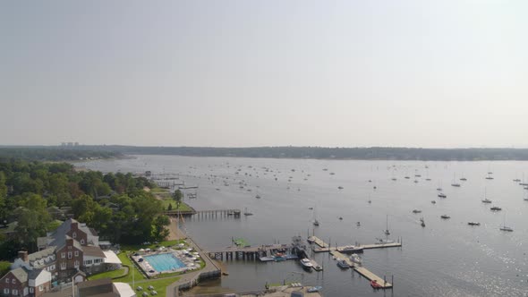 Forward Aerial Pan of Piers and Boats on Manhasset Bay Long Island