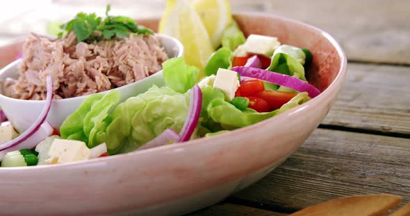 Raw meat and vegetables in bowl