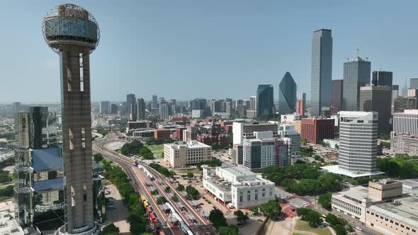 Railroad tracks through downtown Dallas Texas. Aerial skyline view.