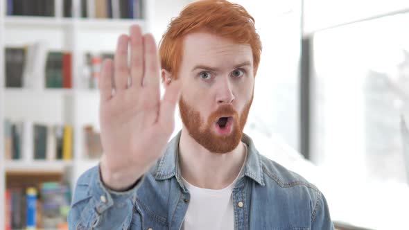 Stop Casual Redhead Man Stopping with Hand