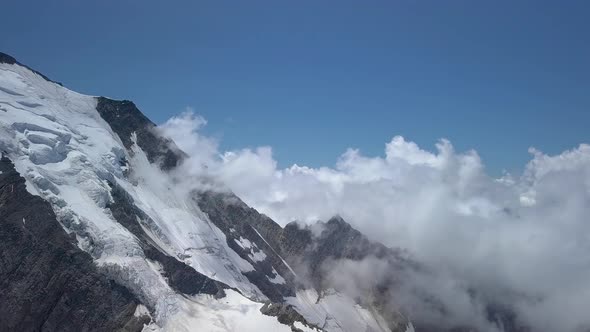 Flying Over Bionnassay Glacier in the Alpine Mountains