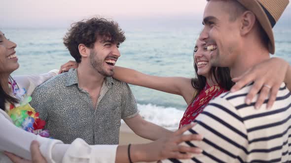 Young Happy Friends Connection Bonding Together in the Beach Laughing and Smiling