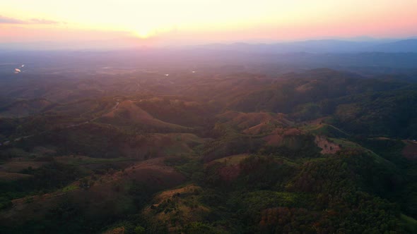 4K Aerial view over beautiful mountains. beautiful sunset over high mountains