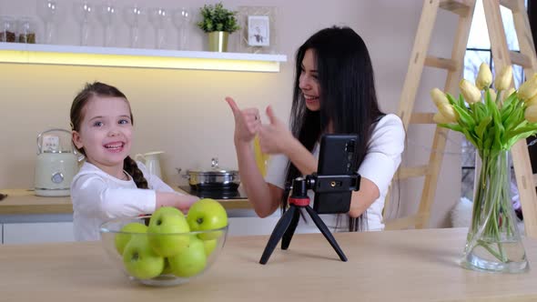 Blogger Mom with Her Baby at Home