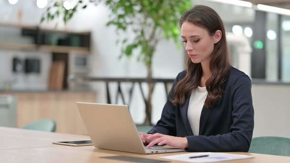 Businesswoman with Laptop Showing No Gesture, Disapprove 