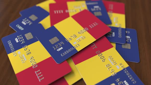 Pile of Credit Cards with Flag of Romania alt