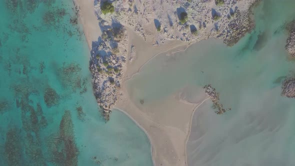 Aerial bird view of a paradise for vacation. Turquoise water, beach and lagoon