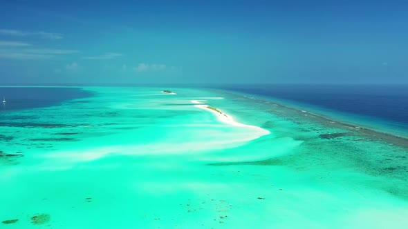 Aerial top down panorama of tranquil coast beach time by clear ocean and white sand background of a 
