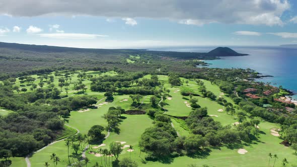 Drone Flying Over the Green Golf Course on Tropical Island Hawaii USA