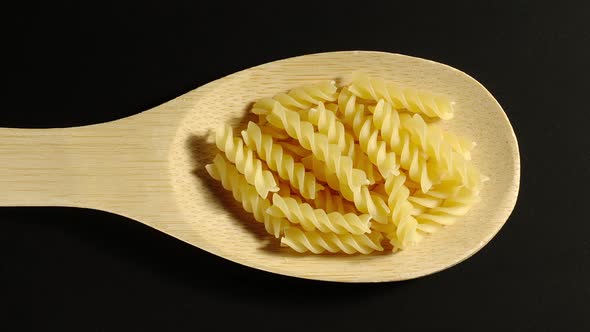 Fusilli Appears In Wooden Spoon