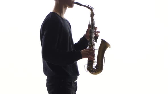 Slow Tunes on Saxophone in the Performance of Young Musician