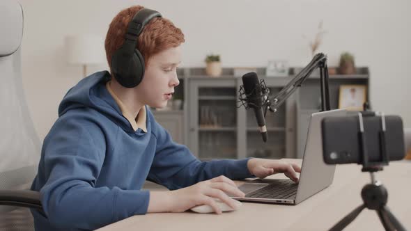 School-aged Influencer Streaming Playing Computer Game