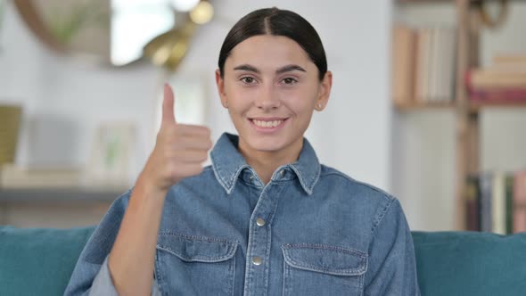 Latin Woman with Thumbs Up