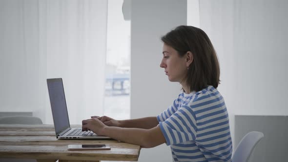 Young woman blogging