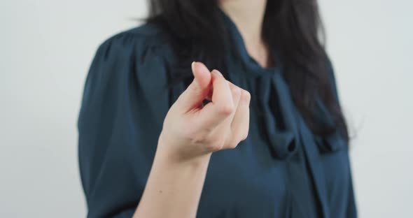 Making the money gesture alt