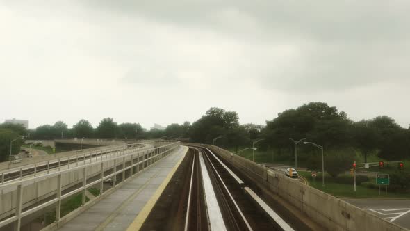 At High Speed The Train Passes Through Tunnels And Bridges.