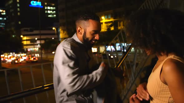 Couple interacting with each other in city street 4k