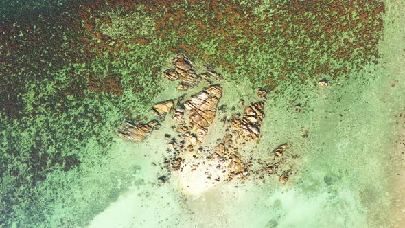 Wide birds eye abstract view of a sunshine white sandy paradise beach and blue ocean background