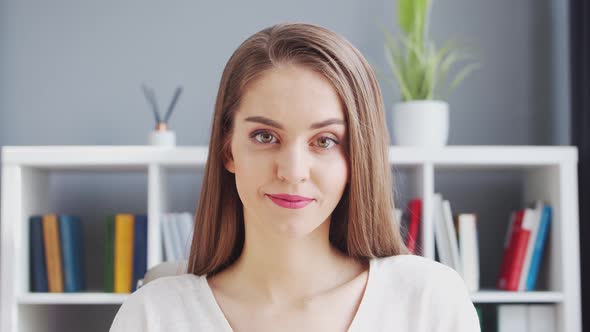 Young Woman Works at Home Office Using Computer.